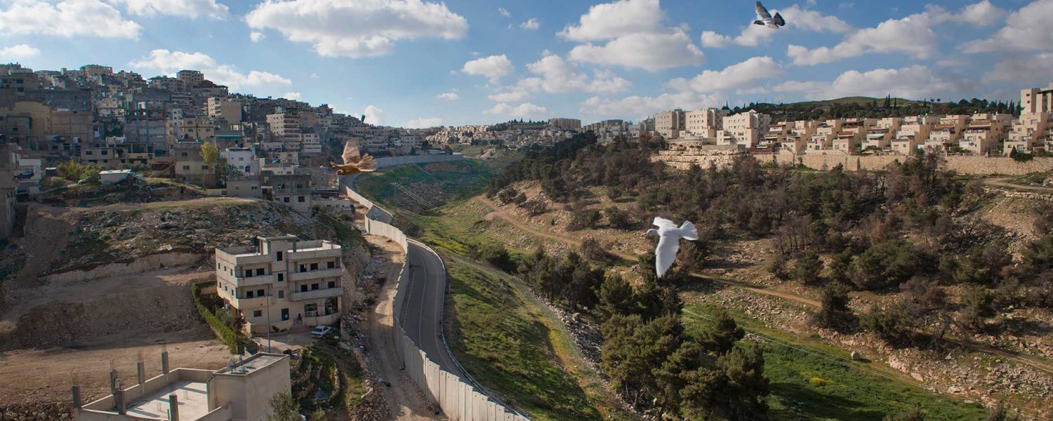 Comparison view of the Palestinian neighborhoods of Shu'fat / Shu‘fat refugee camp (left) and the Israeli Jewish settlement of Pisgat Ze’ev (right), which lies on the “Jerusalem” side of the Separation Wall. April 3, 2017. 