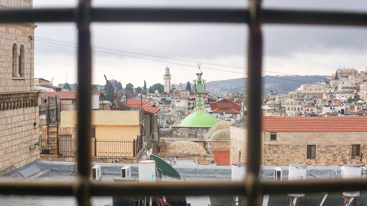 A view from the window of the Arab Counseling Center; iconic Old City landmarks are visible.