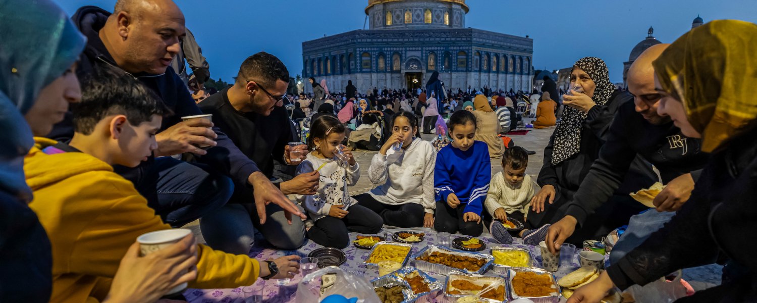 Palestinians break their Ramadan fast together with an Iftar meal at the al-Aqsa Mosque during the March 30, 2024. 