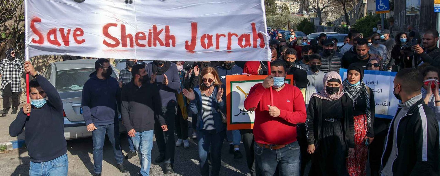 Palestinian, Israeli, and foreign activists demonstrate in Sheikh Jarrah, March 19, 2021.