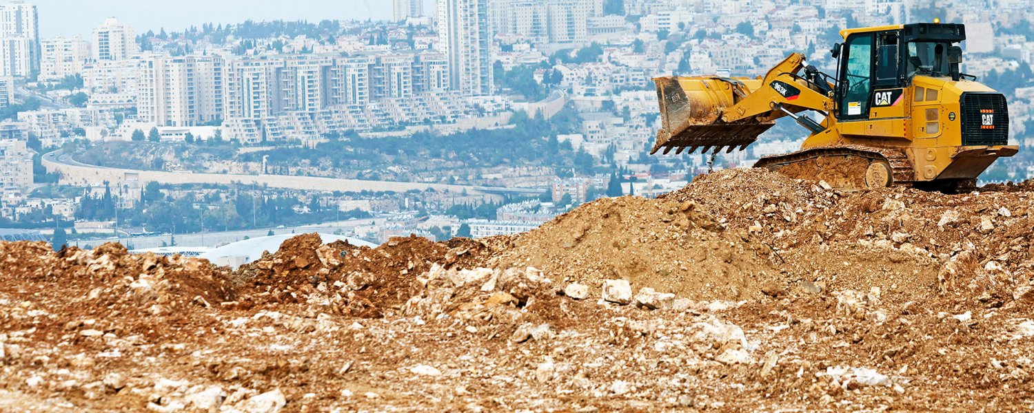 Bulldozer at settlement site in Givat Hamatos, Jerusalem, after Israel approved construction of 1,700 new units, December 7, 2023