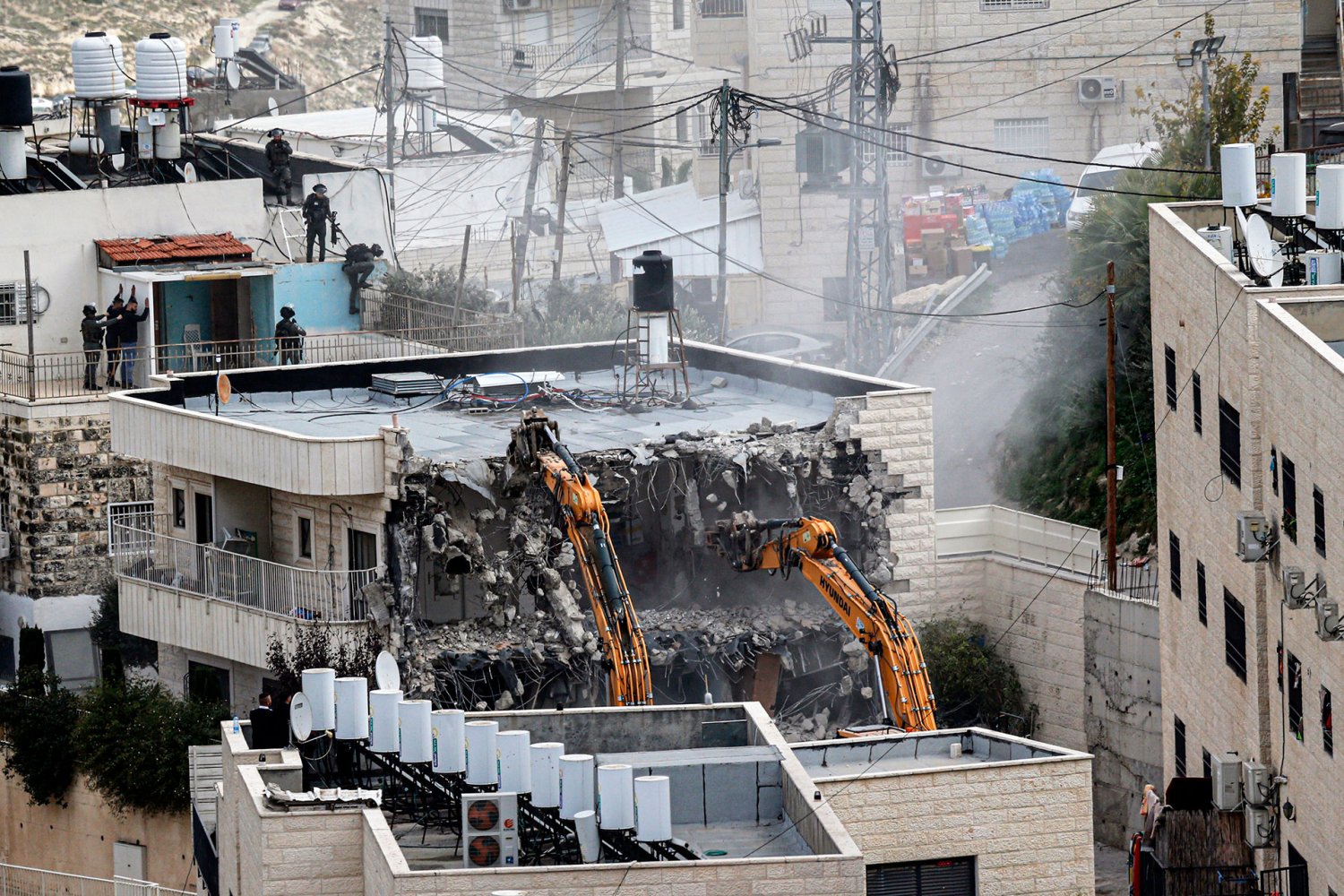 Israeli forces demolish a home belonging to a Palestinian family in Jabal Mukabbir, Jerusalem, January 3, 2024.