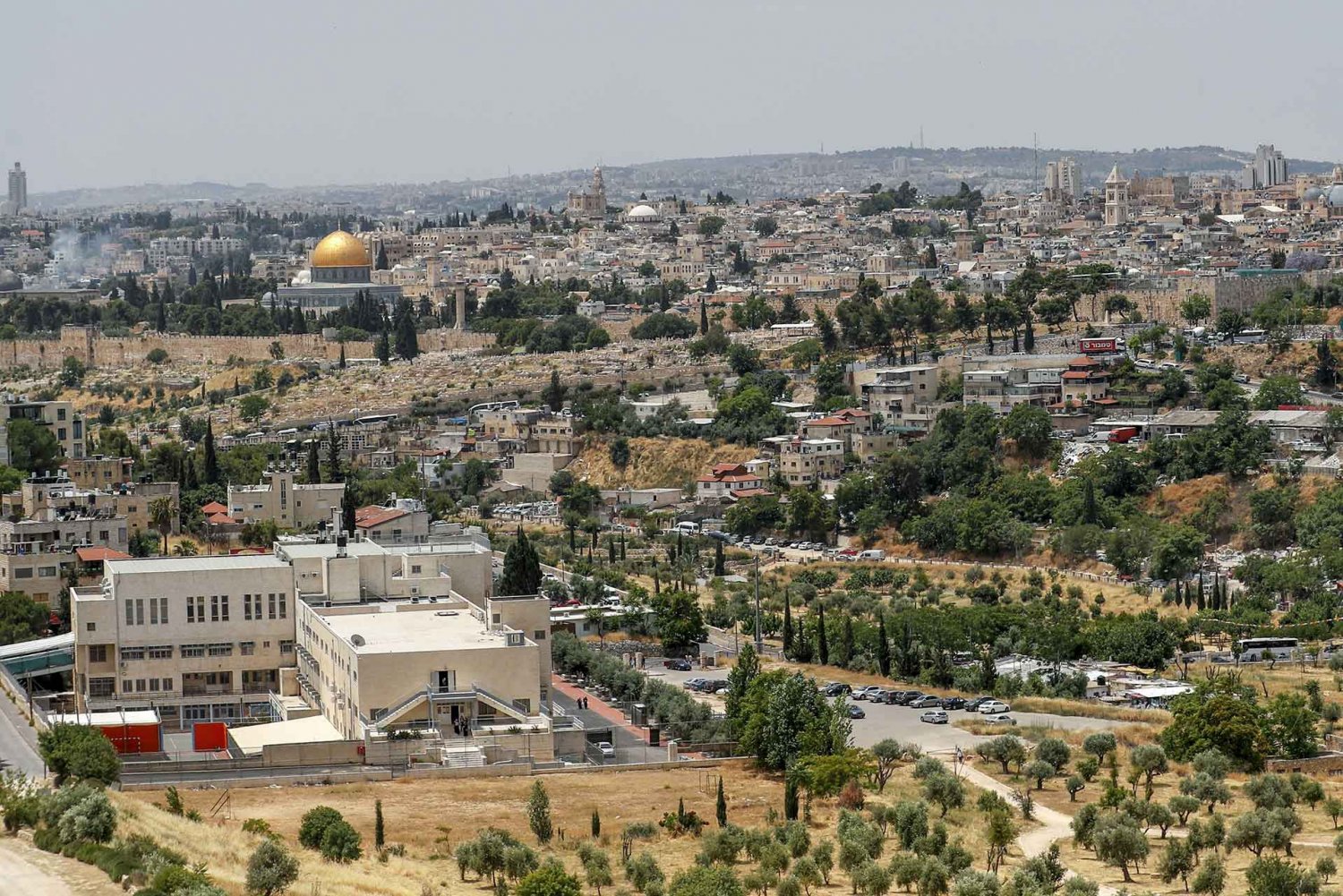 the Palestinian neighborhood of Wadi al-Joz (R) and the golden Dome of the Rock (L) in Jerusalem's Old City, June 3, 2020