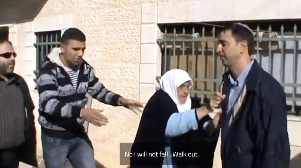 Rifka El-Kurd resists Jewish settlers taking over part of her home in Sheikh Jarrah on December 1, 2009