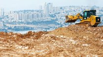 Bulldozer at settlement site in Givat Hamatos, Jerusalem, after Israel approved construction of 1,700 new units, December 7, 2023