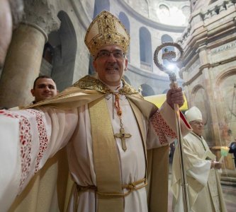 Cardinal Pierbattista Pizzaballa greets worshippers on Easter at the Church of the Holy Sepulchre, Jerusalem, March 31, 2024.