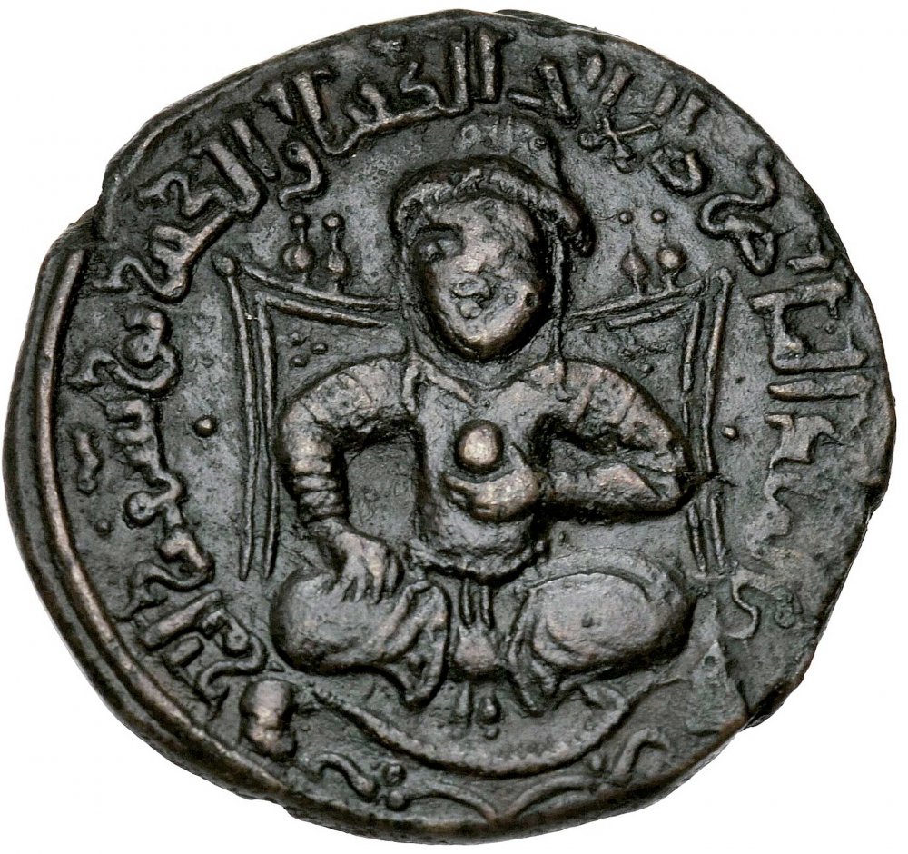 Coin dated 1190–1191 showing Salah al-Din al-Ayyubi sitting cross-legged on a high-backed throne