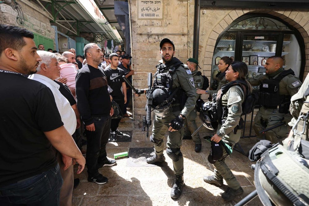 Israeli forces limit Palestinian Muslims’ movement through the Old City following Ramadan Friday prayers, April 5, 2024.
