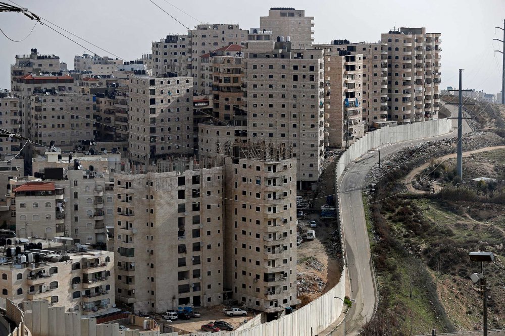 The densely populated Shu‘fat refugee camp has been walled off from the city by Israel.