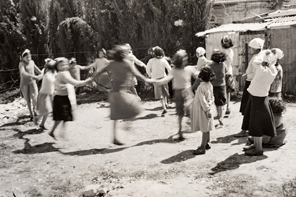 A group of students dance at Rawdat El-Zuhur school in Jerusalem.