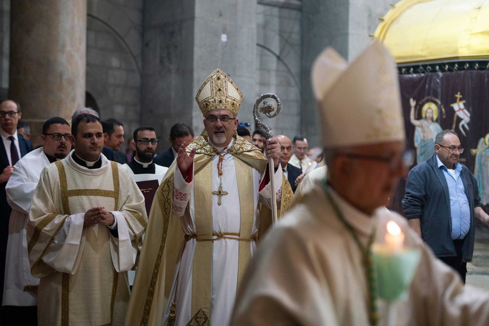 Cardinal Pierbattista Pizzaballa greets worshippers on Easter at the Church of the Holy Sepulchre, Jerusalem, March 31, 2024.