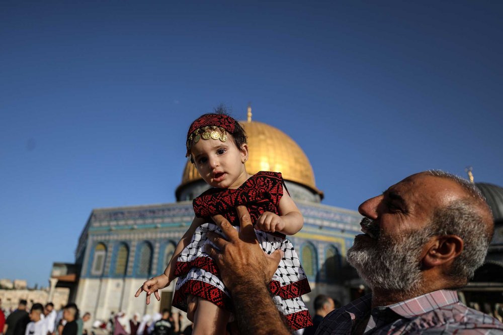 Palestinians observe Eid al-Adha at al-Aqsa Mosque, Jerusalem, June 16, 2024.