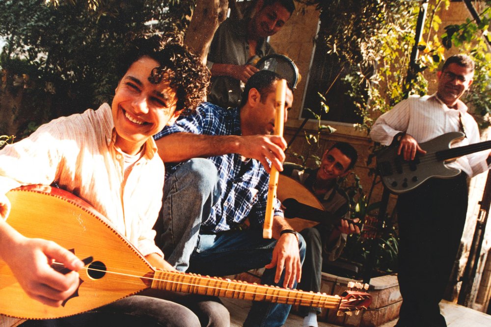 Palestinian musicians of the Sabreen band play together in Jerusalem.