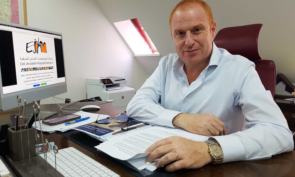 Dr. Fadi al-Atrash in his office at Augusta Victoria Hospital, East Jerusalem, June 25, 2024