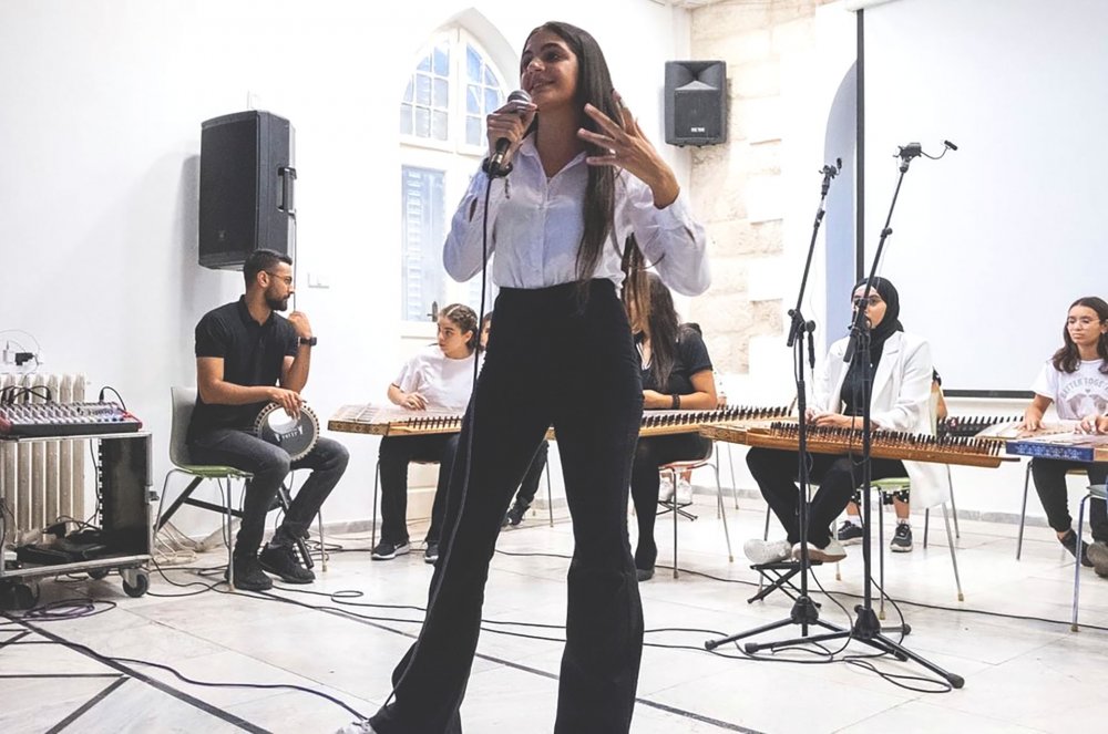 Young Palestinian singers perform Arabic music at Sabreen’s studio in Sheikh Jarrah, Jerusalem, September 28, 2022.