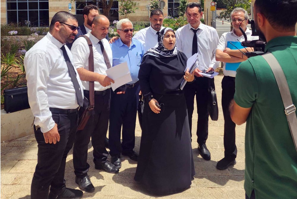 Advocate Sana Doueik updates the media on the Khalidi family waqf case outside the court, June 28, 2024.