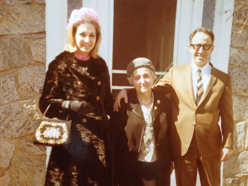 Sylvia, Nabiha, and Albert stand outside their home in Manhasset, Long Island, ca. 1968.