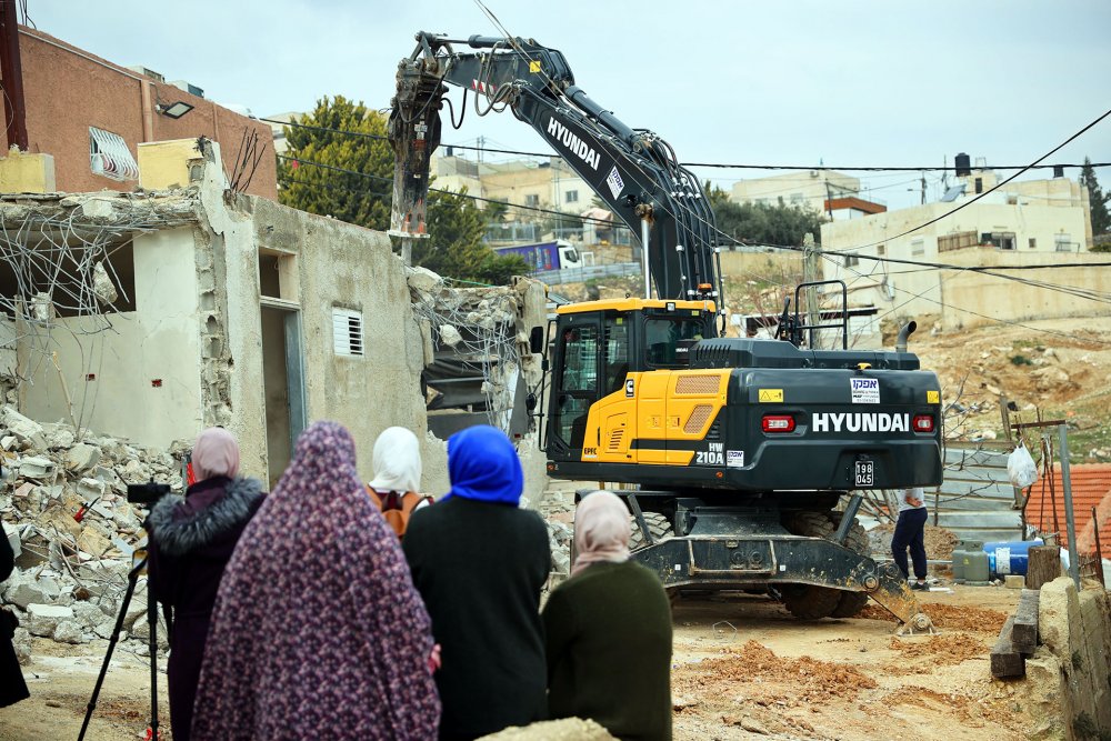 A Palestinian family demolished their own home in Jabal Mukabbir, East Jerusalem, January 2022.