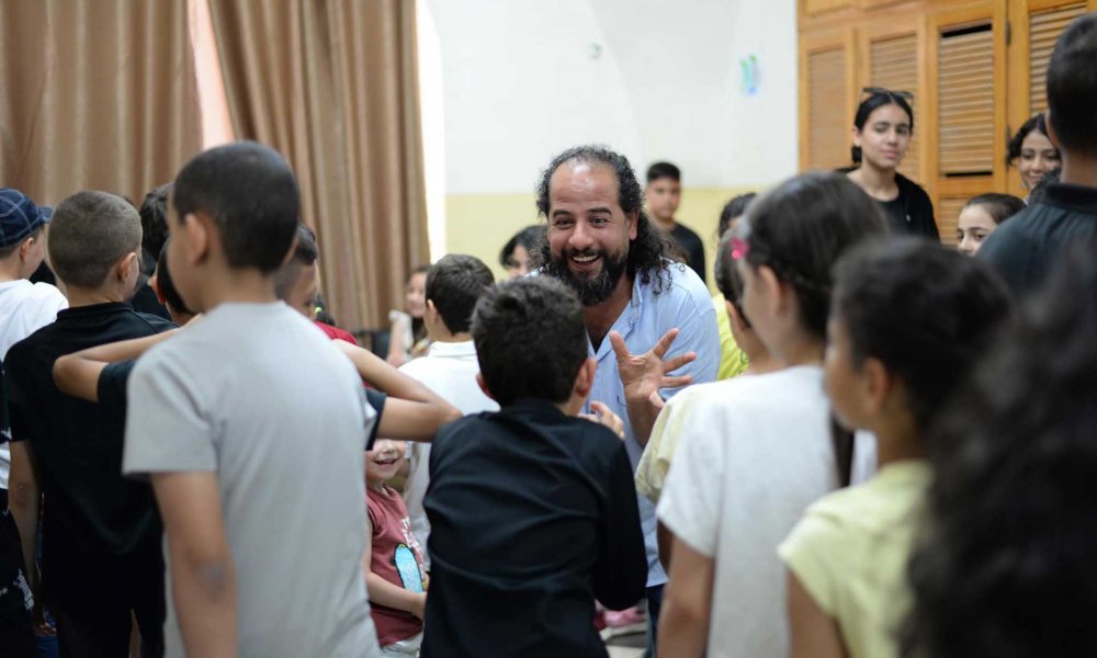 Trauma specialist Yazan interacting with children at the Spafford Children’s Center in Jerusalem