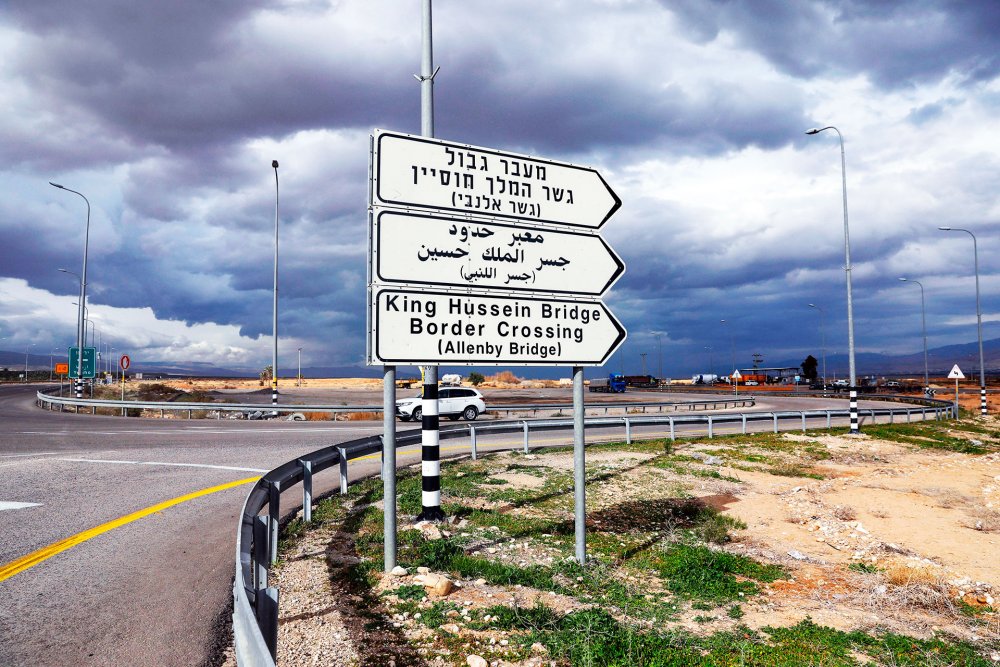 A road sign to the King Hussein Bridge crossing to Jordan, Jericho, West Bank, January 28, 2021