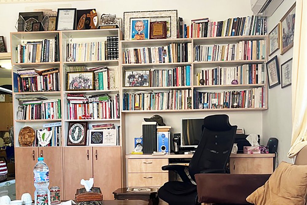 The home library of Jerusalem novelist Mahmoud Shukair, where many of his awards are displayed