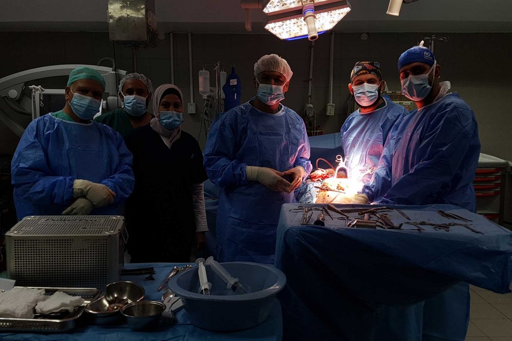 A team of surgeons inside an operating room at Makassed Hospital in Jerusalem, October 30, 2024