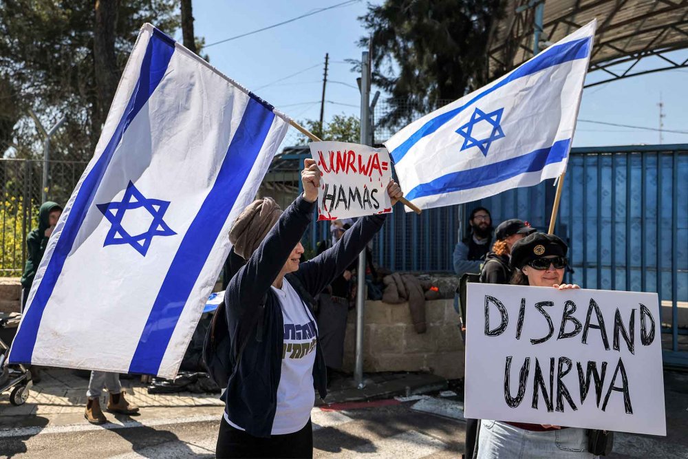 An Israeli protester calls for the closing of UNRWA facilities in Jerusalem, March 20, 2024.