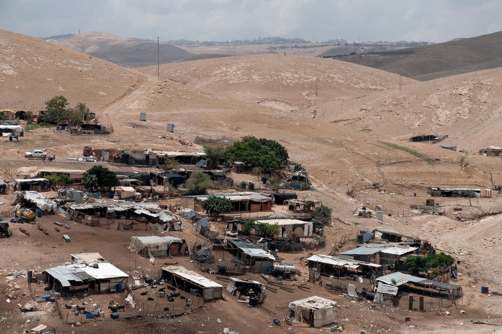 Homes and animals in the Palestinian Bedouin village of Khan al-Ahmar, Jerusalem, May 30, 2018