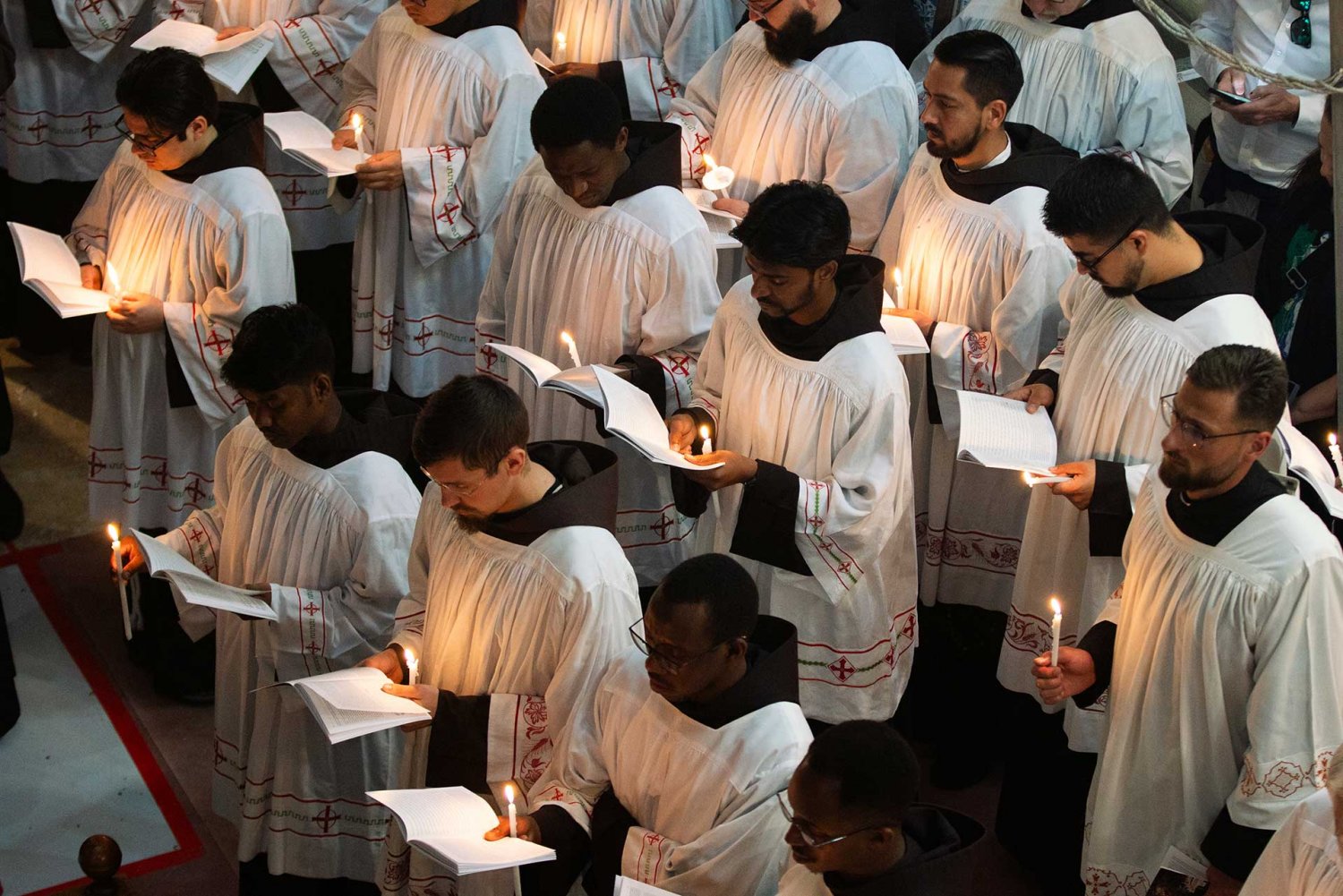 The choir sings during Easter service, Church of the Holy Sepulchre, Jerusalem March 31, 2024.