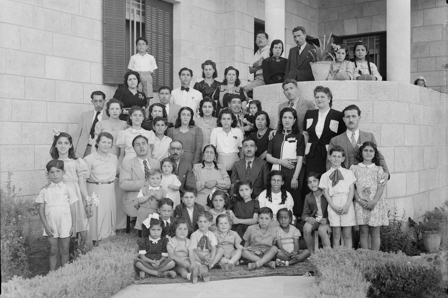 Dr. Mahmoud Dajani and family at his home, Qatamon, Jerusalem 1945